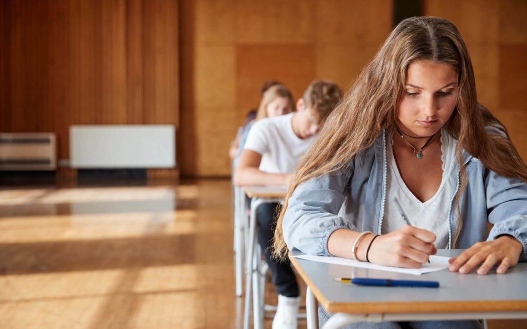 girl with long hair taking exam